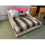 Large cream and button upholstered chaise longue/bed, with central striped upholstered cushion,