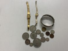 Hallmarked silver hinged bracelet, and 2 old yellow metal watches , and a quantity of coins,