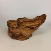 A modern olive wood bowl, with unusual handle design, 39cm long overall