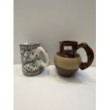 Two jugs, 1 hand painted Portugal jug, and a Denbigh brown glazed