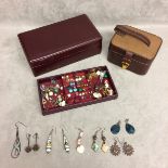 Red jewellery box and a travelling jewellery box, both in used condition, and containing 9ct gold