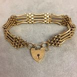 9 ct gold gate link bracelet with 9ct gold locket charm 23 g