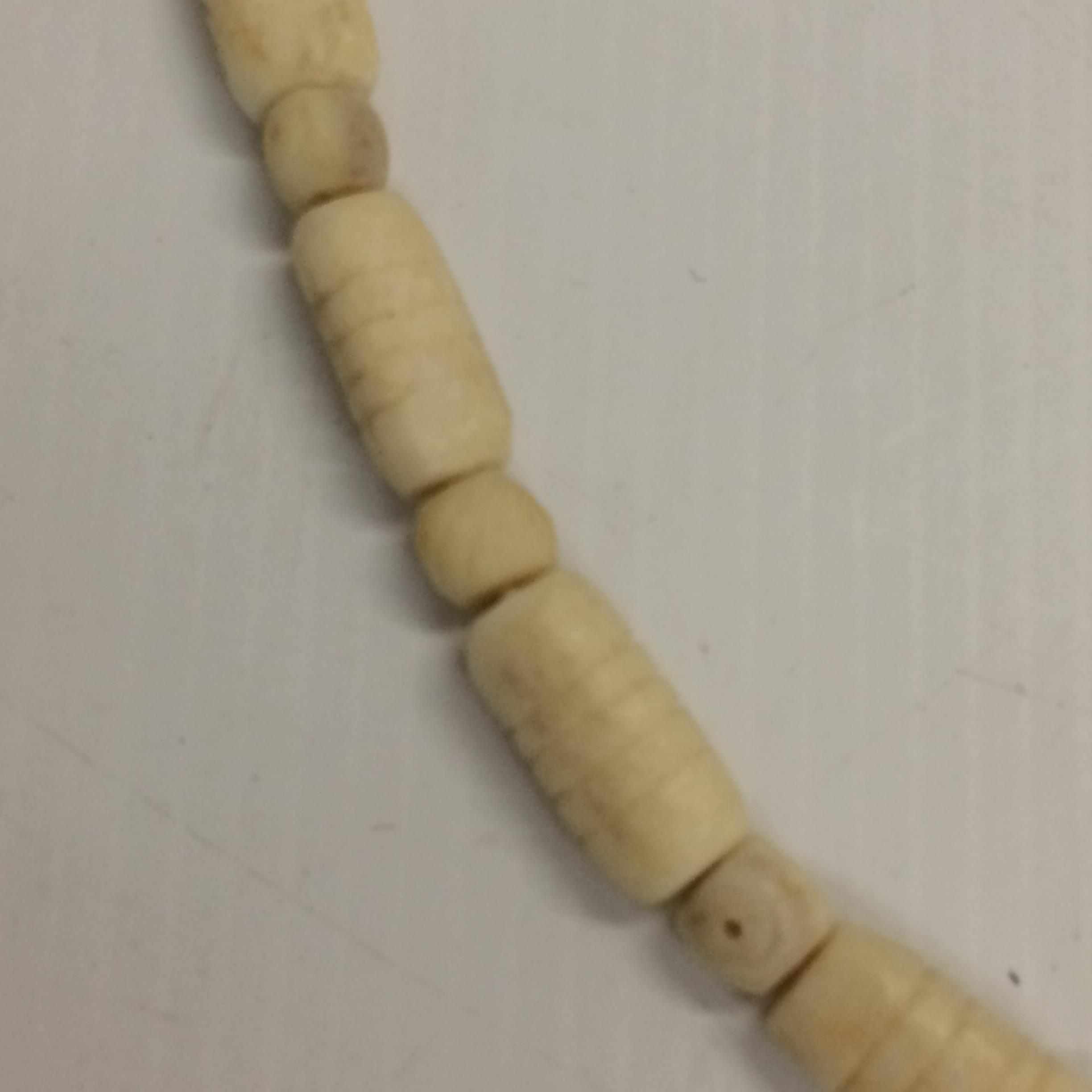 A quantity of bone necklaces and figures - Image 7 of 7