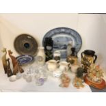 Quantity of china to include Willow Pattern plates, meat platter, Cherished Teddies, Nao, and