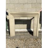 A modern stone fire surround ( in 3 separate pieces), some wear/damage