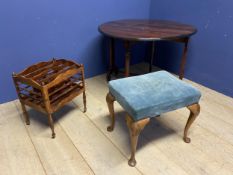 An oval drop leaf table, a canterbury and a blue upholstered stool