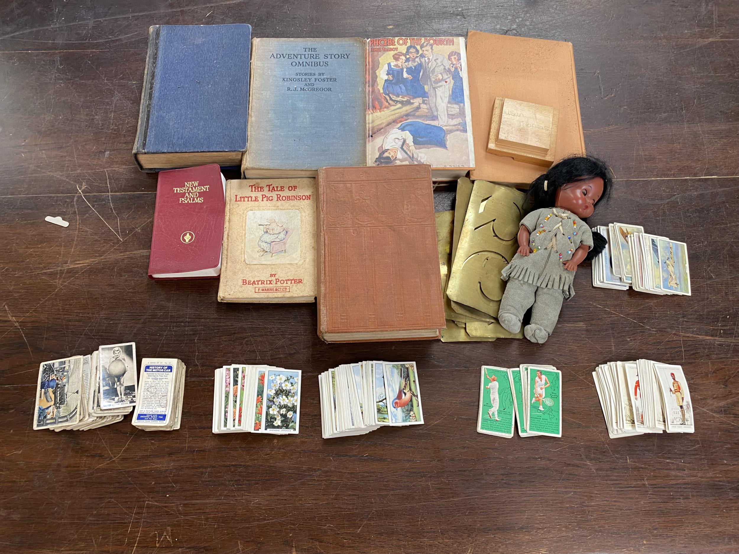 Quantity of books and cigarette cards