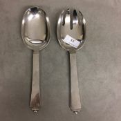 Pair of sterling silver Georg Jenson salad servers, step and ball finials , 272 g marked GEORG