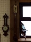 3 Barometers - a stick barometer, and an oak framed wall barometer, and an oak framed barometer on