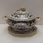 A large china lidded tureen and plate (some wear)