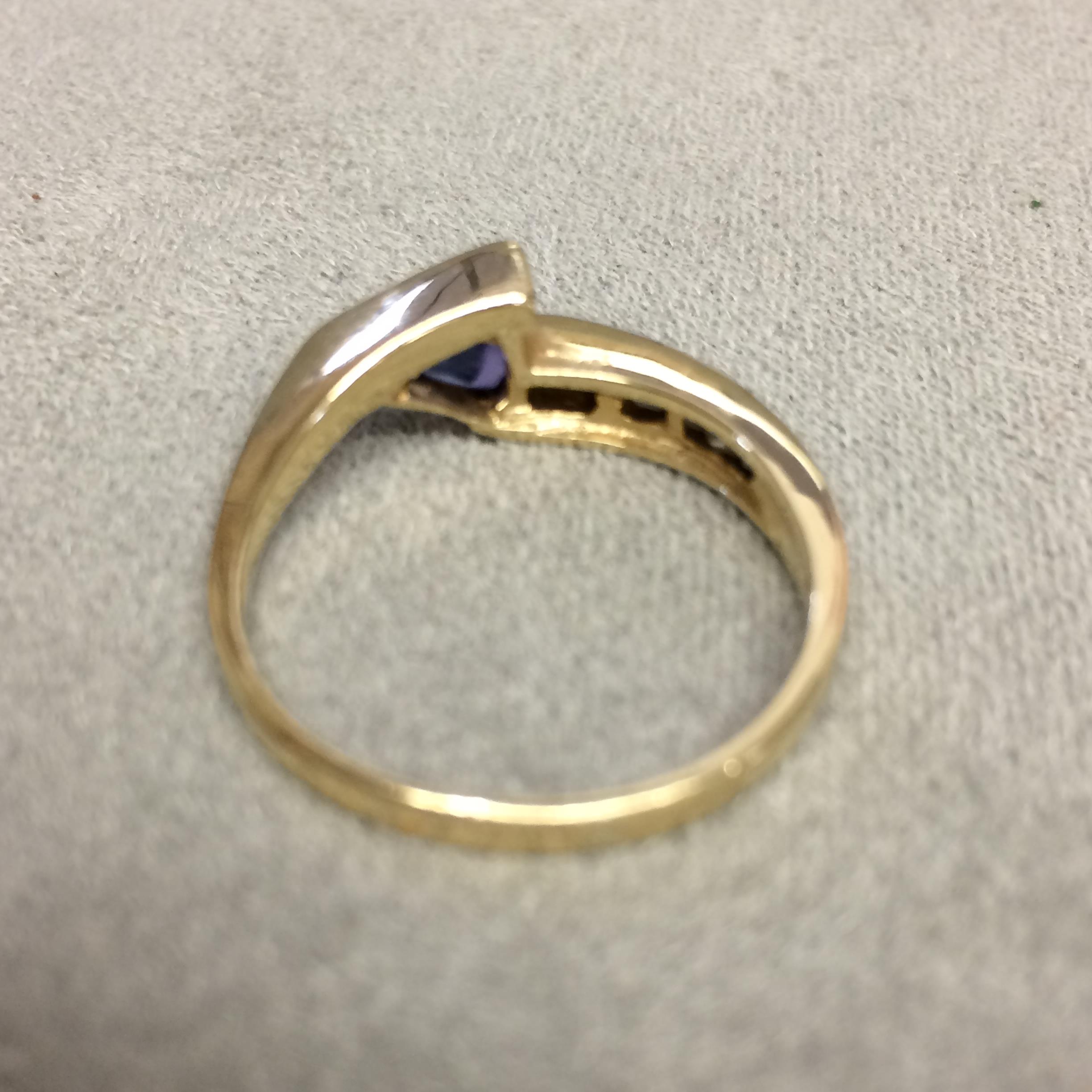 14k gold Tanzanite and diamond ring, central free cut tanzanite with square channel set diamonds - Image 4 of 5