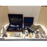 A quantity of silver plated items to include cased flat ware, forks and knives etc