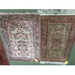 2 silk rugs, 158 x 102cm; 153 x 93cm, one with square green panel ground and red geometric wide