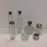 Quantity of sterling silver lidded and white metal dressing table items (3 rounded top ones are
