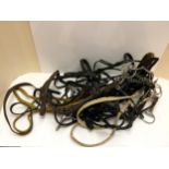 Quantity of tack, to include bridles, good set of reins etc