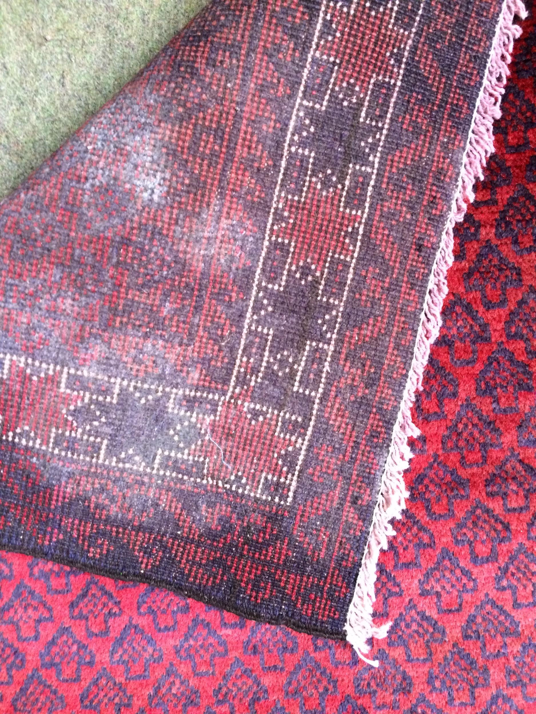 4 rugs, 3 red ground rugs with all over geometric stylized designs, and a blue and red ground Tree - Image 8 of 9