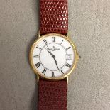 18k gold cased automatic gentleman's wristwatch by Baume and Mercier, 30 mm case with white face and