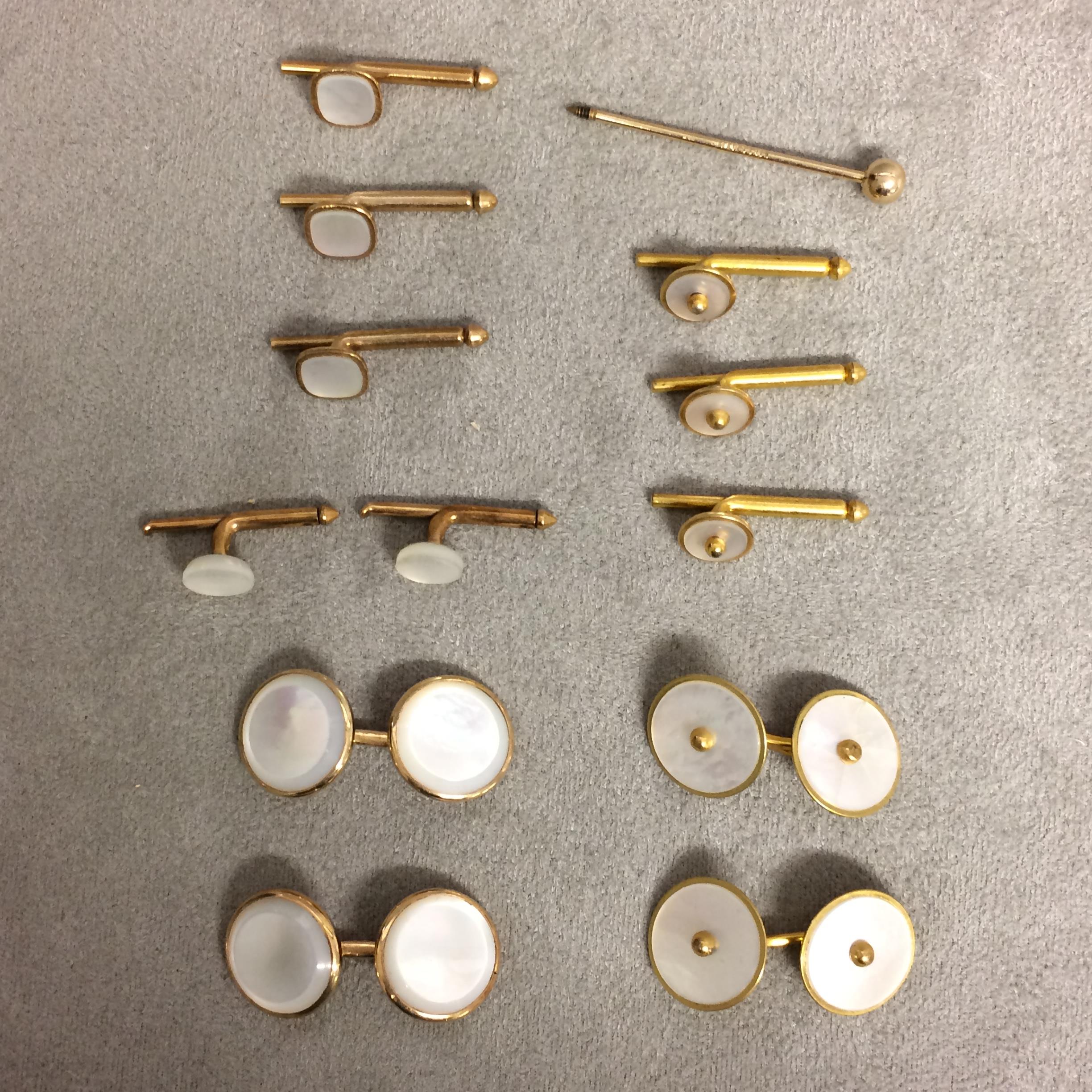 Collection of unmarked yellow metal and mother of pearl cufflinks and dress studs, 18g