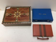 Quantity of cased travel games including mah-jong