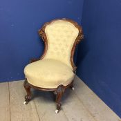 Victorian yellow upholstered button back chair with cabriole legs to China castors