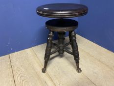 Revolving piano stool, on unusual glass ball and claw feet, The Char and Parker company stamp to