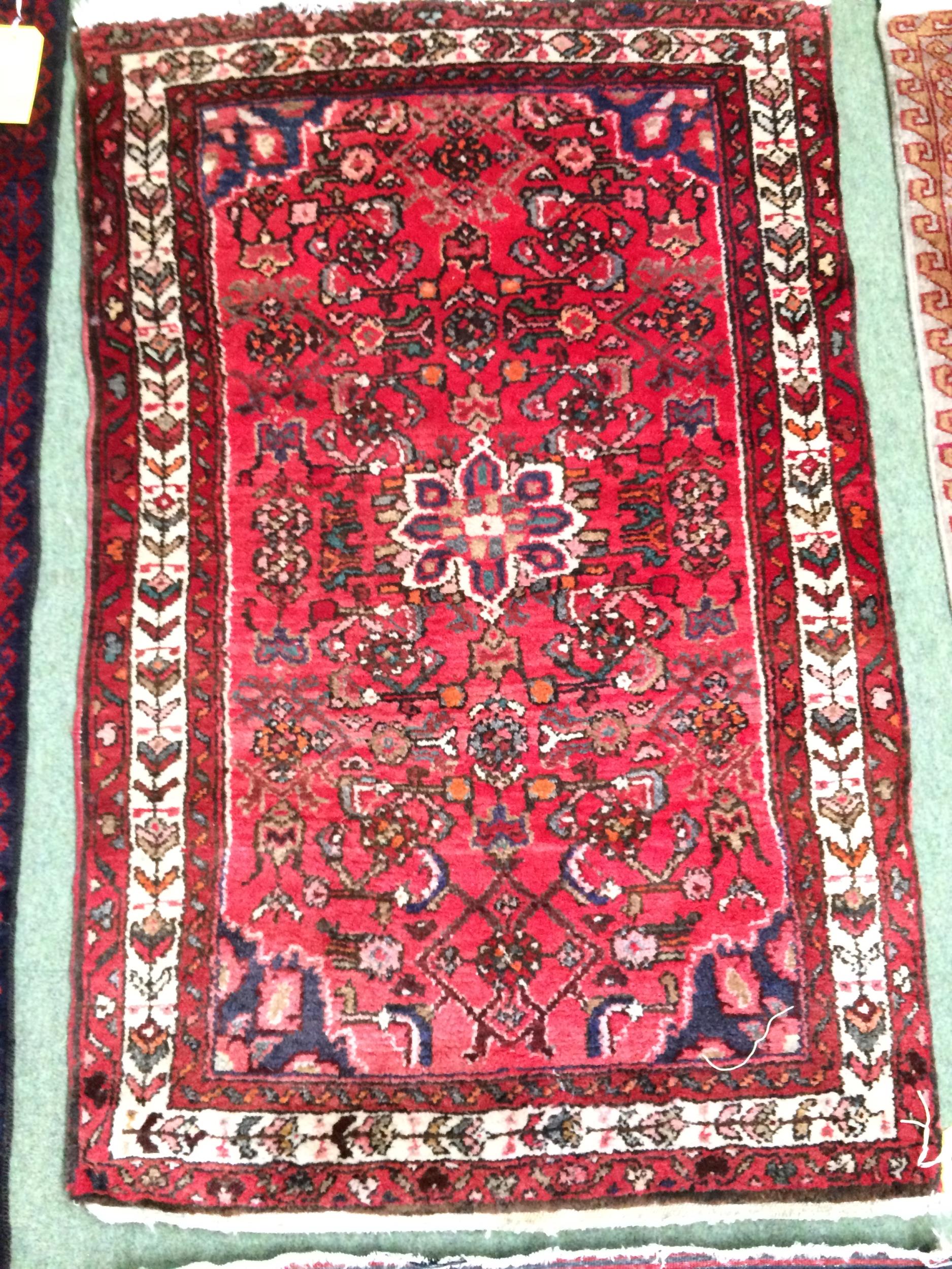 4 rugs, 3 red ground rugs with all over geometric stylized designs, and a blue and red ground Tree - Image 5 of 9
