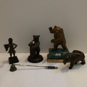 Two C20th carved Black Forrest bears, (one with some wear and ear off), gilt bear on a faux