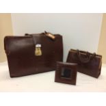 Leather brief case, frame and handbag