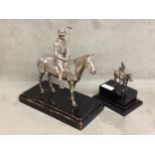 Sterling silver model of a seated polo player on a polo pony, with Sterling silver polo mallett,