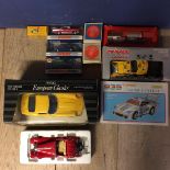 A collection of die cast model vehicles of various makers and scales to include Corgi, Majorette and