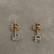 Pair of 18ct yellow and white gold single stone diamond ear suds, single brilliant cut diamonds in