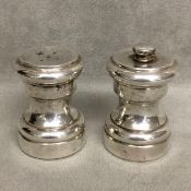 Pair Cartier sterling silver salt and pepper grinders, each marked Cartier Sterling 7