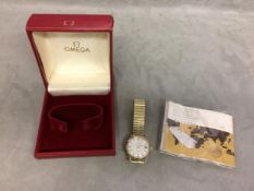 Unmarked yellow metal Omega DeVille Gents Automatic wrist watch, 32mm yellow metal case, ivory