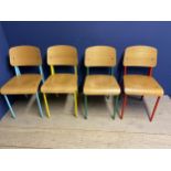 A set of 4 vintage style chairs with moulded ply seats and backs, and coloured