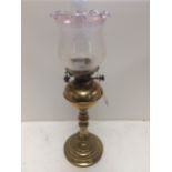 Brass oil lamp and glass funnel and shade