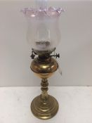 Brass oil lamp and glass funnel and shade