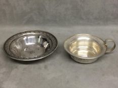 Two American sterling silver items to include sweet meat dish with cast rim, and sterling silver cup