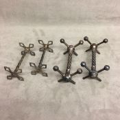 Two pairs of sterling silver knife rests by Altkin Brothers, Sheffield and Sutherland and Roland