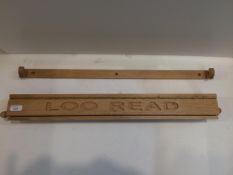 A "Lou Reed" toilet reader wall mounted stand