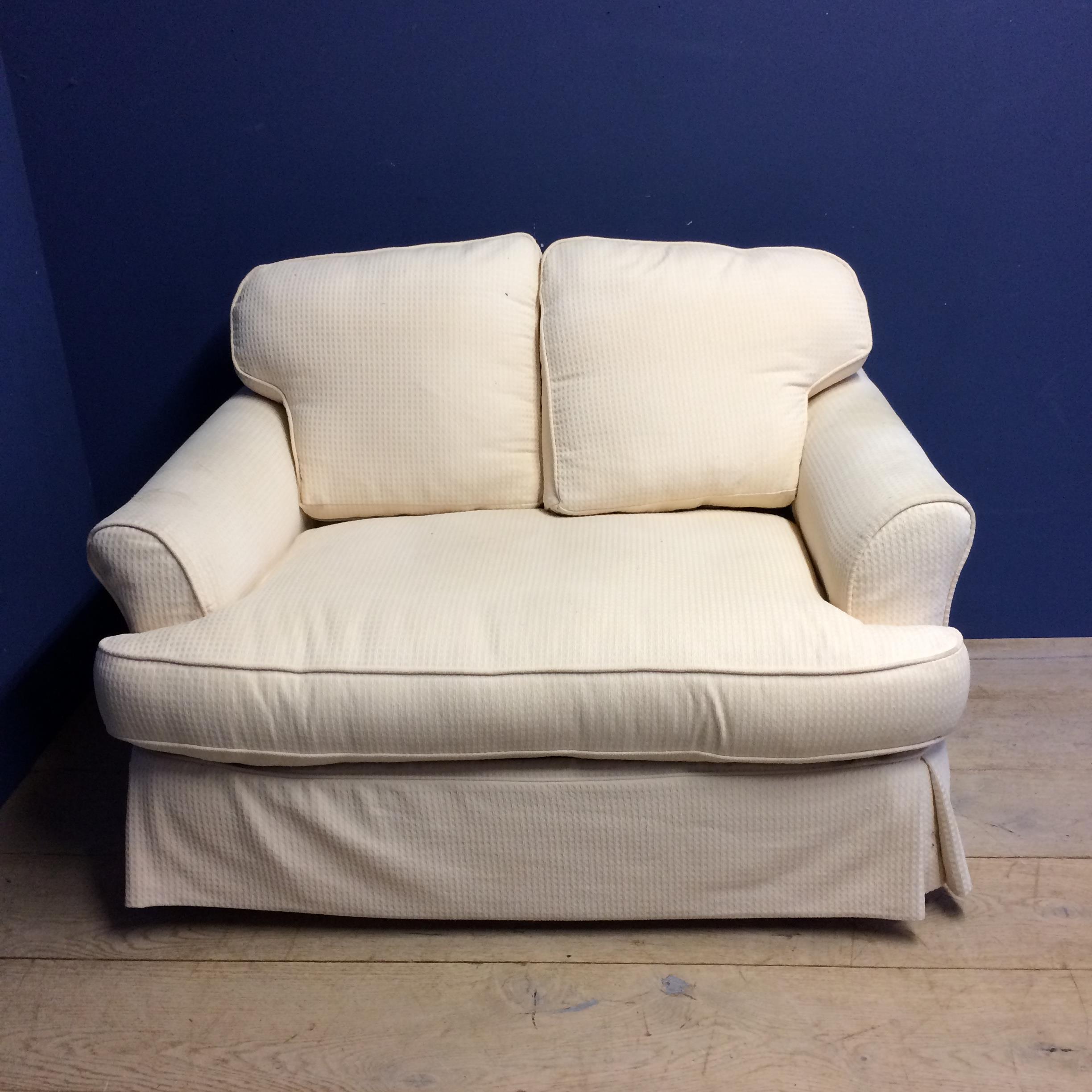 Sofa bed, upholstered in cream fabric (in used condition -ie upholstery needs some cleaning)