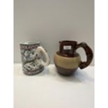 Two jugs, 1 hand painted Portugal jug, and a Denbigh brown glazed