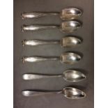 six unmarked yellow metal tea spoons, 92g
