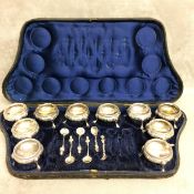 Cased set of 10 Victorian sterling silver salts, each with chased decoration and beaded rim raised
