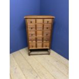 A light coloured wooden 5 drawer narrow chest 108 x 121 x 70h cm