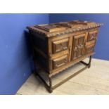 Jacobean style chest, raised on a stretcher base, and with rising lid, 118w x 94h x 57cm D