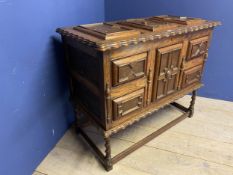 Jacobean style chest, raised on a stretcher base, and with rising lid, 118w x 94h x 57cm D