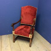 Matching arm chair to the above lot 531; large oak framed arm chair with red upholstery