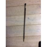 A sword stick /brass and wooden walking cane, with carved and bone inlaid patterns;