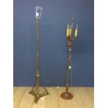 Two standing lamps, one single heavy 165cm, one 3 branch possible brass and red enamel, 172cmH