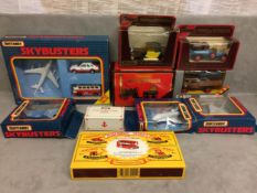 A collection of Matchbox toy cars in original boxes various scales and models